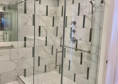 Image of white with black accents contemporary shower from ShowerDoorKing.