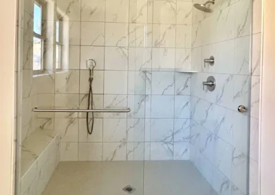 Image of white and gray contemporary shower from ShowerDoorKing.