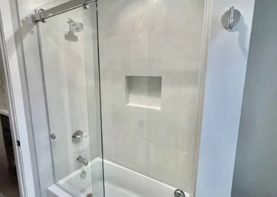 Image of white and gray contemporary shower from ShowerDoorKing.