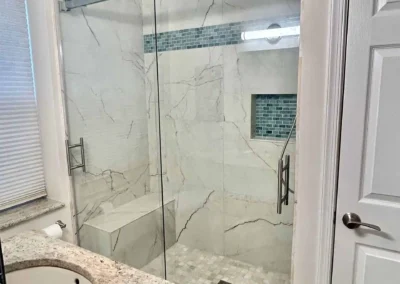 Image of white and tan contemporary shower from ShowerDoorKing.