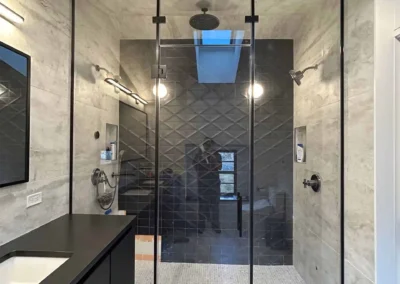 Image of gray and black contemporary shower from ShowerDoorKing.